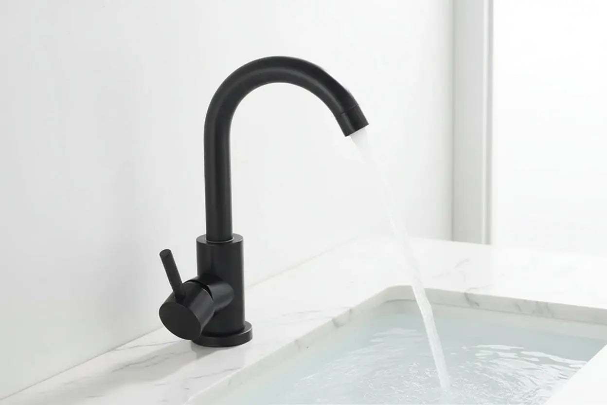 Black single handle basin mixer tap in modern bathroom setting