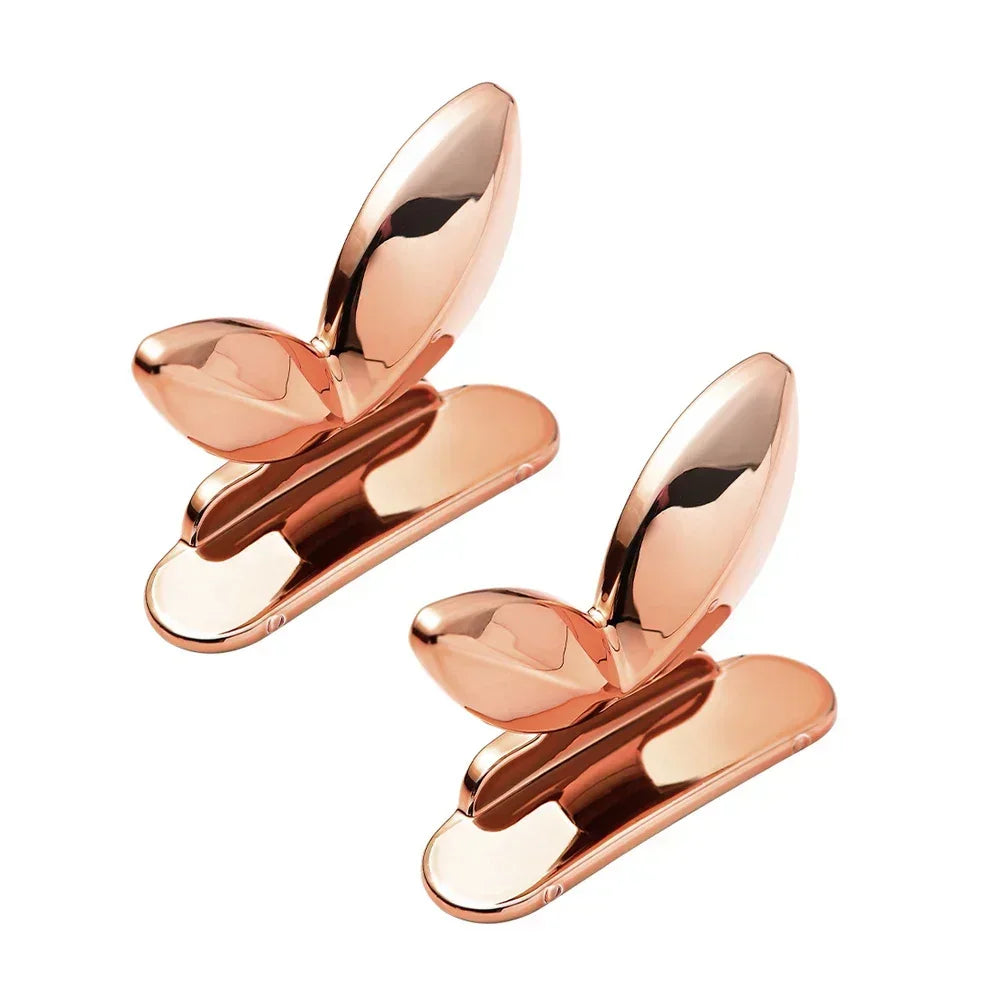 Pair of rose gold toilet seat lid lifter handles made from ABS