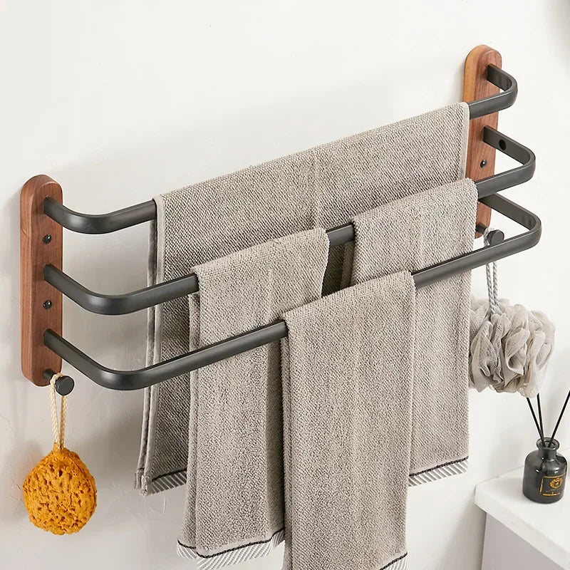 Walnut wood double towel bar with black metal arms, wall-mounted bathroom accessory