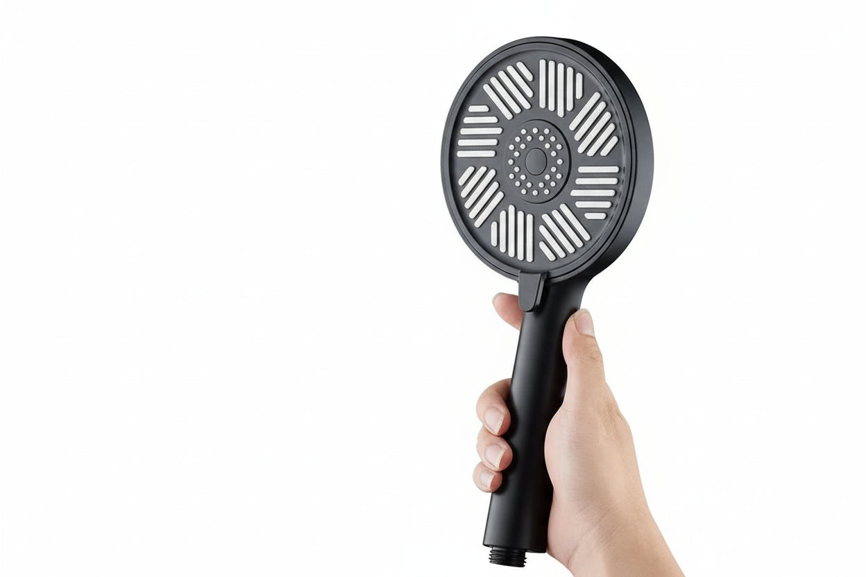 Handheld high-pressure shower head with ergonomic grip and water-saving spray pattern