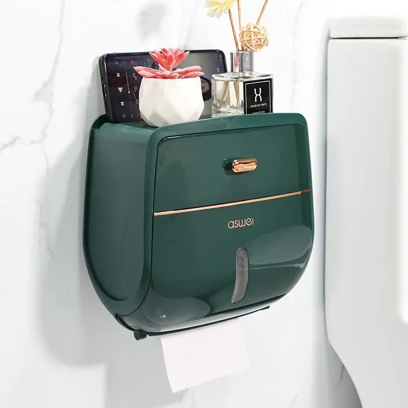 Dark green wall-mounted toilet paper holder with enclosed storage and top shelf