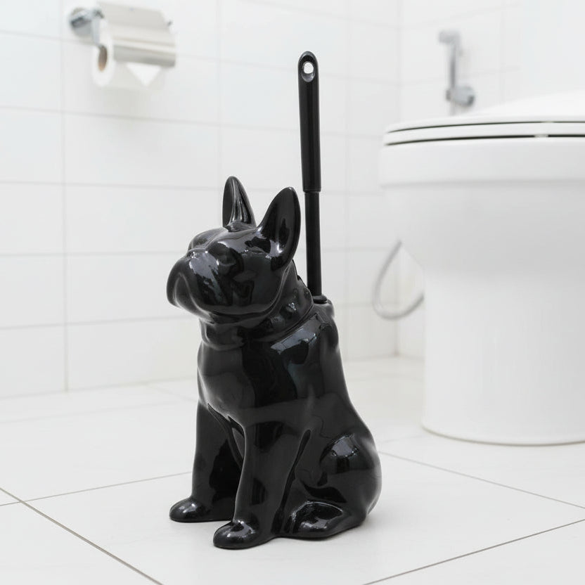 Black dog-shaped toilet brush holder in the white bathroom background