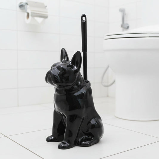 Black dog-shaped toilet brush holder in the white bathroom background