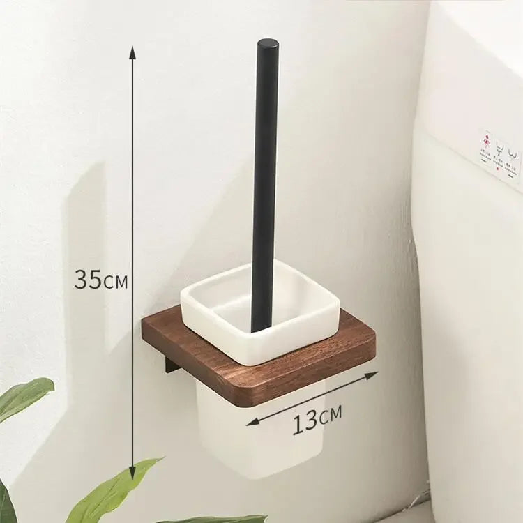 Wall-mounted toilet brush holder with measurements on a white wall.