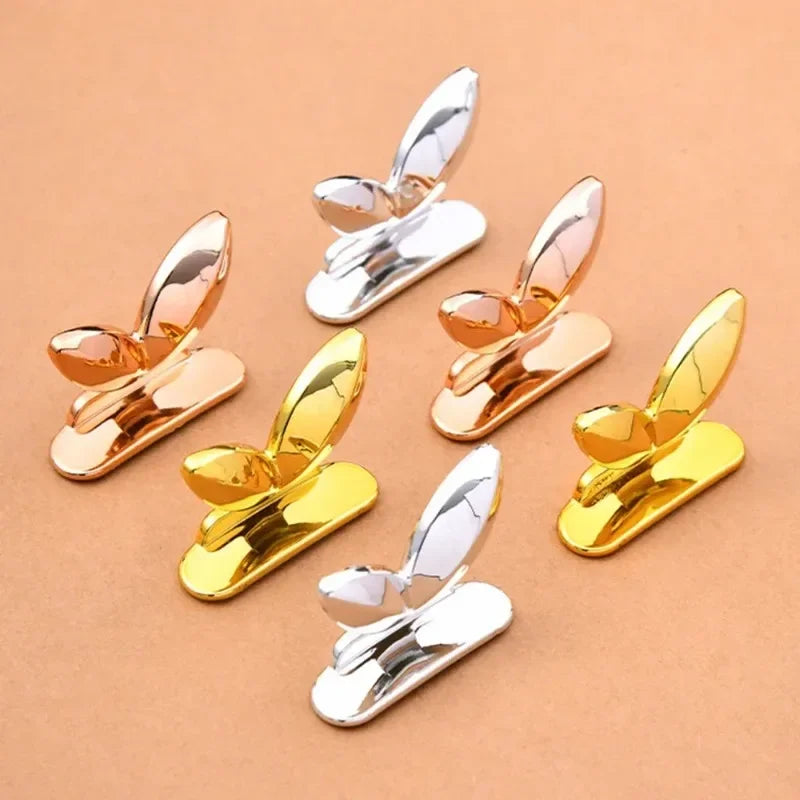 Set of decorative toilet seat lid lifter handles in multiple colours