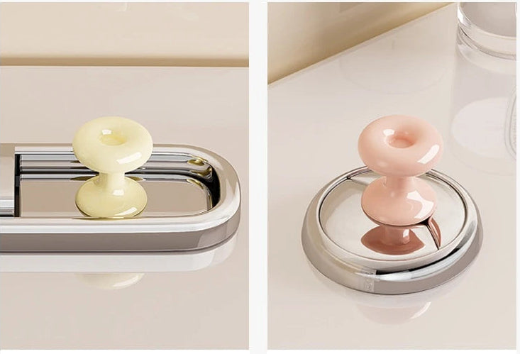 Close-up of decorative toilet flush button cover with smooth glossy finish