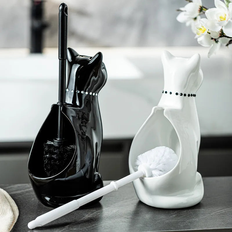 Open ceramic cat toilet brush holder showing hidden brush storage design